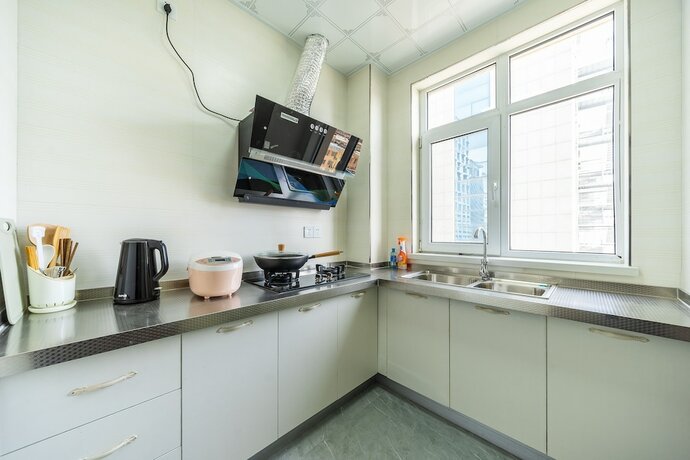 Imagen general del Hotel Youjia Apartment - Maoye Plaza. Foto 8