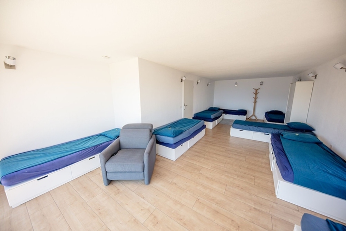 Imagen de la habitación del Hotel Young Backpackers Homestay. Foto 5