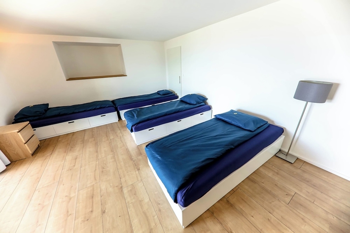 Imagen de la habitación del Hotel Young Backpackers Homestay. Foto 6