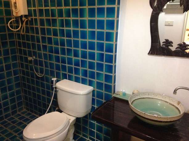 Imagen de la habitación del Hotel Young Coconut Garden Home Resort. Foto 13