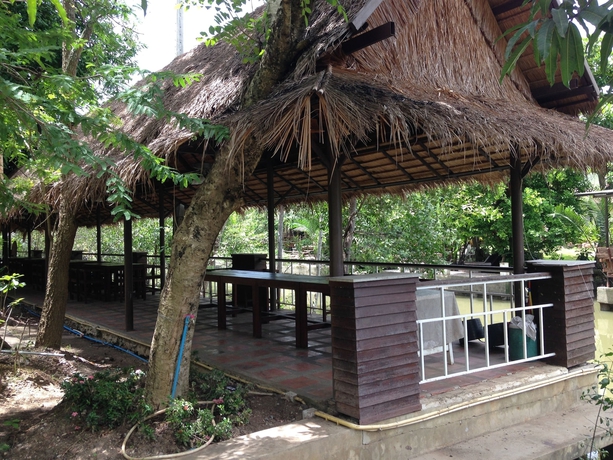 Imagen del bar/restaurante del Hotel Young Coconut Garden Home Resort. Foto 3