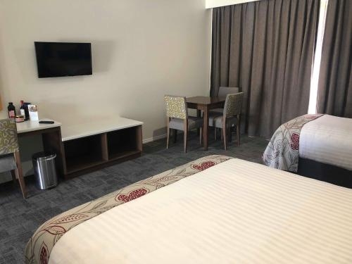 Imagen de la habitación del Hotel Young Federation Motor Inn. Foto 6