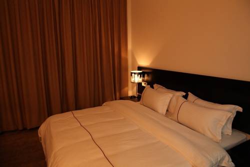 Imagen de la habitación del Hotel Your Distance Home. Foto 1