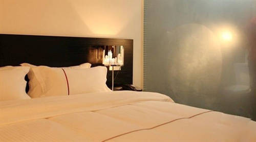 Imagen de la habitación del Hotel Your Distance Home. Foto 6