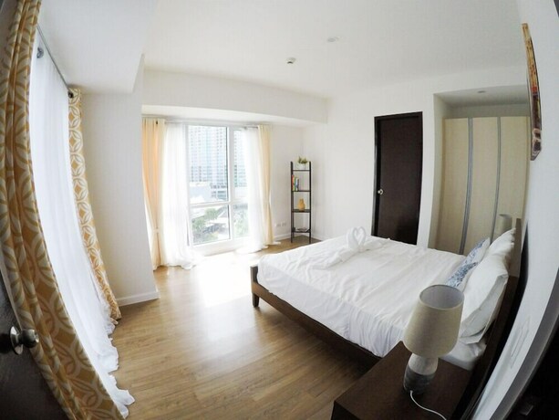 Imagen de la habitación del Hotel Your Dream Home At Abreeza Davao. Foto 22