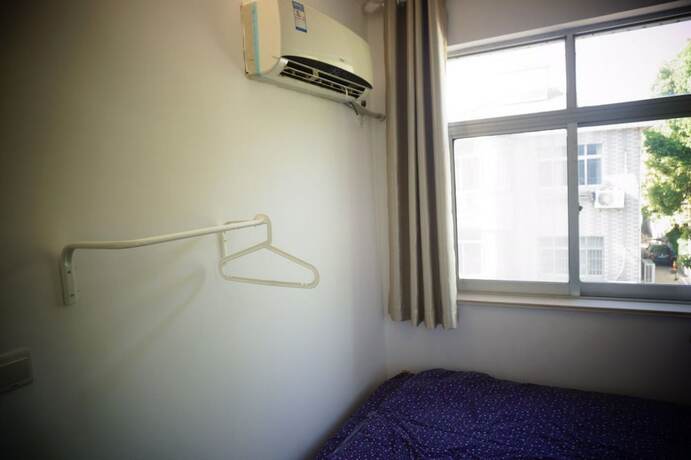 Imagen de la habitación del Hotel Youshe Youth Apartment. Foto 13