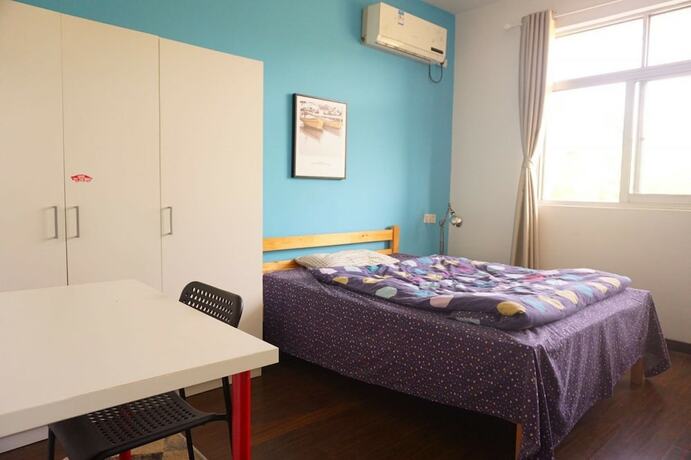 Imagen de la habitación del Hotel Youshe Youth Apartment. Foto 16