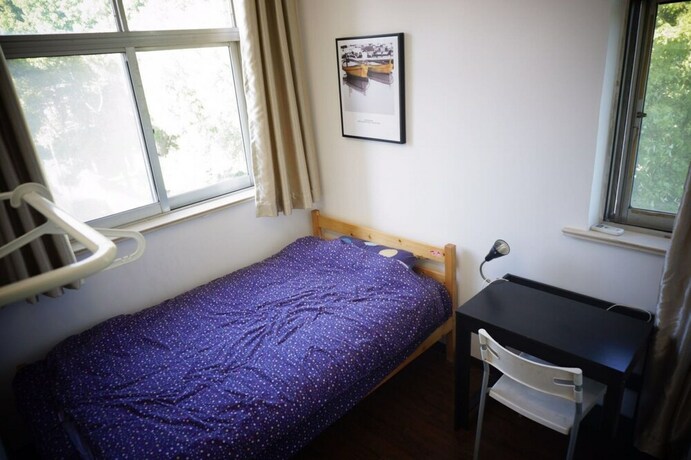 Imagen general del Hotel Youshe Youth Apartment. Foto 11