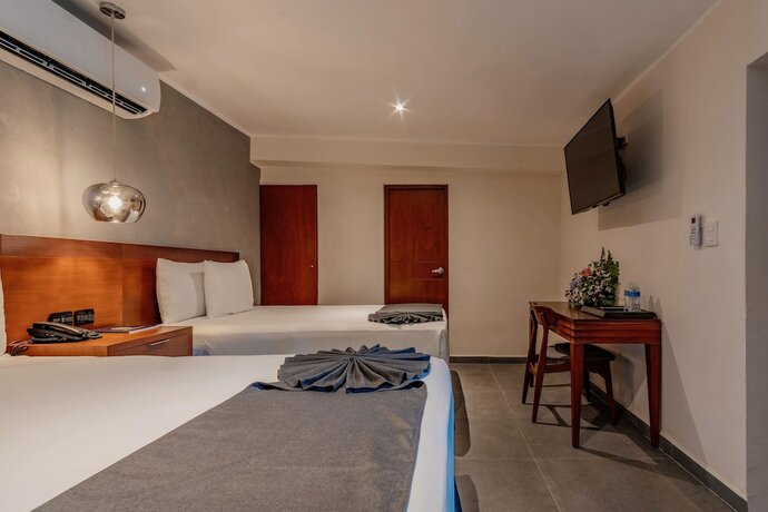 Imagen de la habitación del Hotel Youssef Exceptionnel Merida. Foto 18