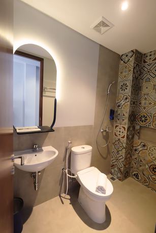 Imagen de la habitación del Hotel Youstay Semarang By Sinergi. Foto 2