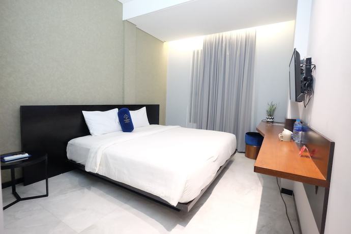 Imagen de la habitación del Hotel Youstay Semarang By Sinergi. Foto 4