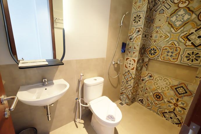 Imagen de la habitación del Hotel Youstay Semarang By Sinergi. Foto 5