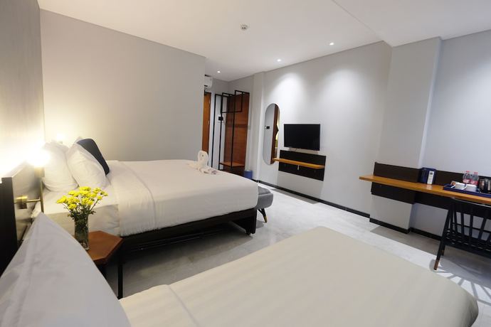 Imagen de la habitación del Hotel Youstay Semarang By Sinergi. Foto 6
