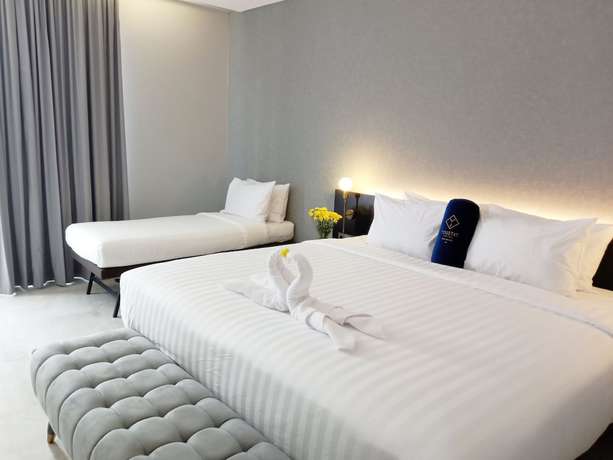 Imagen de la habitación del Hotel Youstay Semarang By Sinergi. Foto 7