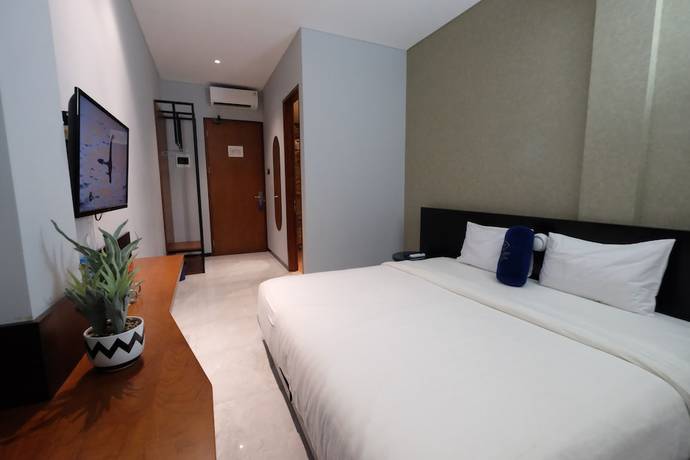 Imagen de la habitación del Hotel Youstay Semarang By Sinergi. Foto 12