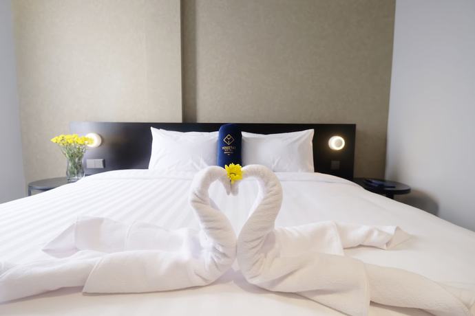 Imagen de la habitación del Hotel Youstay Semarang By Sinergi. Foto 13