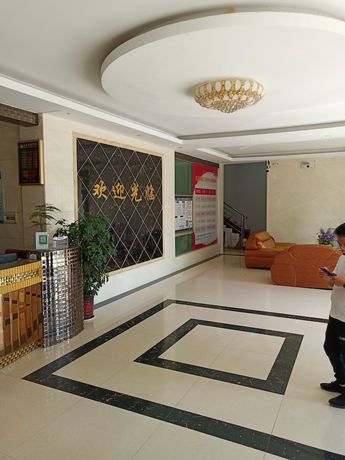 Imagen de los interiores del Hotel Youyi Business. Foto 8