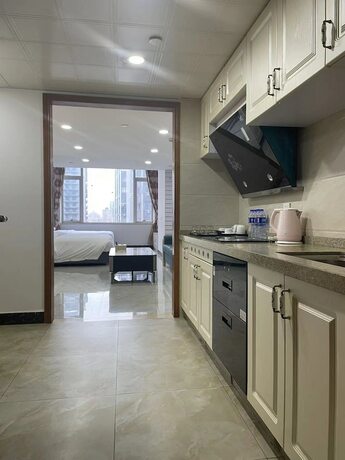 Imagen de la habitación del Hotel Yoyo International Apartment. Foto 17