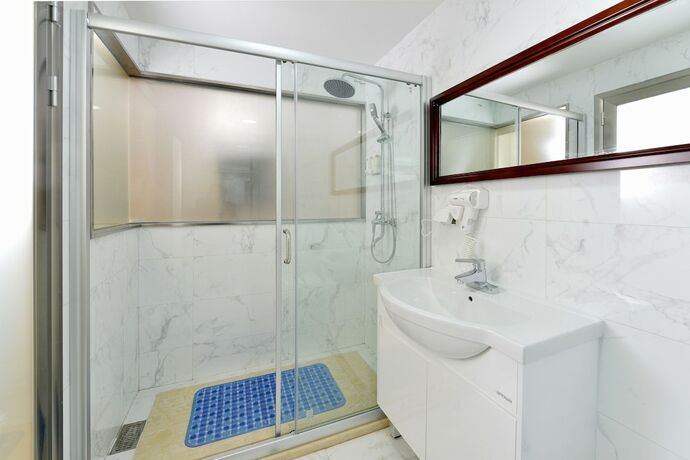 Imagen de la habitación del Hotel Yoyo International Apartment. Foto 19