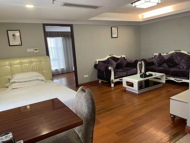 Imagen de la habitación del Hotel Yoyo International Apartment. Foto 20