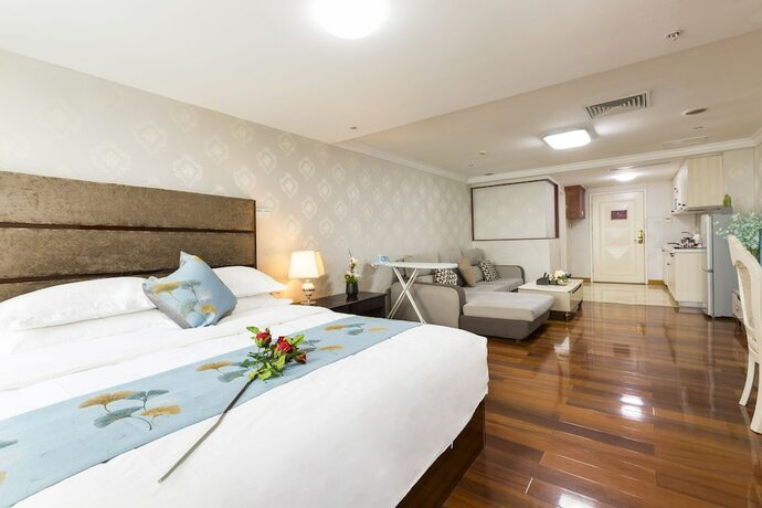 Imagen de la habitación del Hotel Yoyo International Apartment. Foto 21