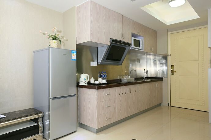 Imagen de la habitación del Hotel Yoyo International Apartment. Foto 25