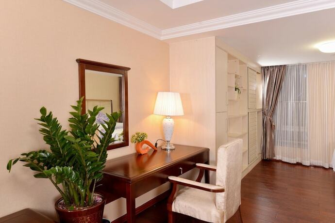 Imagen de la habitación del Hotel Yoyo International Apartment. Foto 27