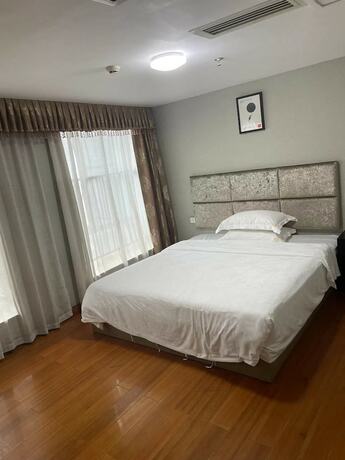 Imagen de la habitación del Hotel Yoyo International Apartment. Foto 28
