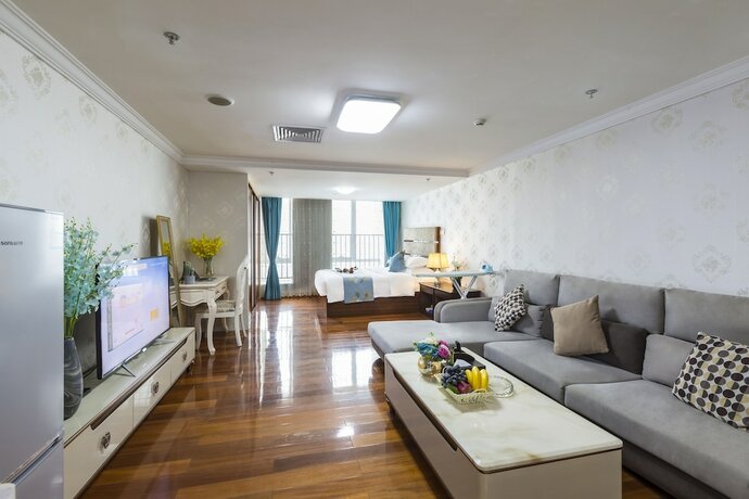Imagen de la habitación del Hotel Yoyo International Apartment. Foto 30