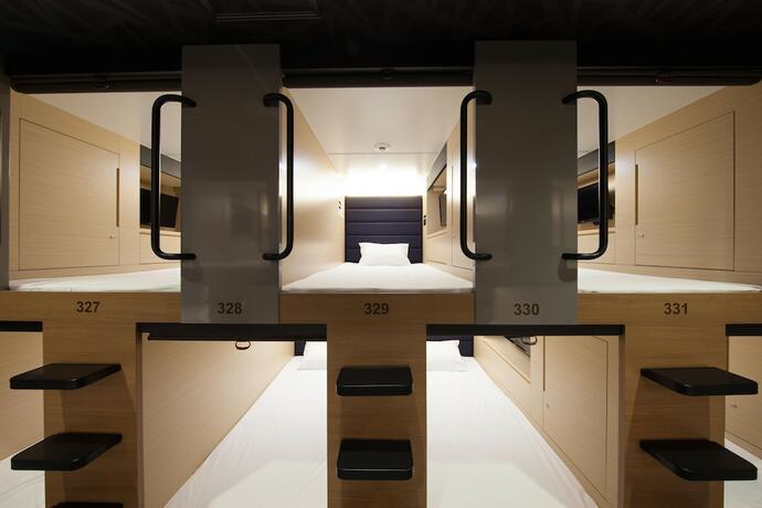 Imagen de la habitación del Hotel Y's Cabin Osaka Namba. Foto 17