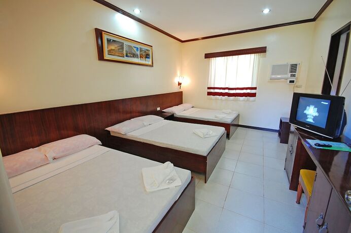 Imagen de la habitación del Hotel Ysabelle Mansion. Foto 15