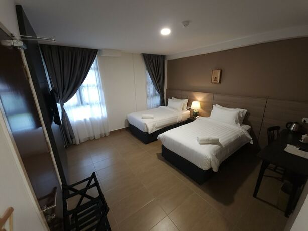 Imagen de la habitación del Hotel Yu Chinatown. Foto 16