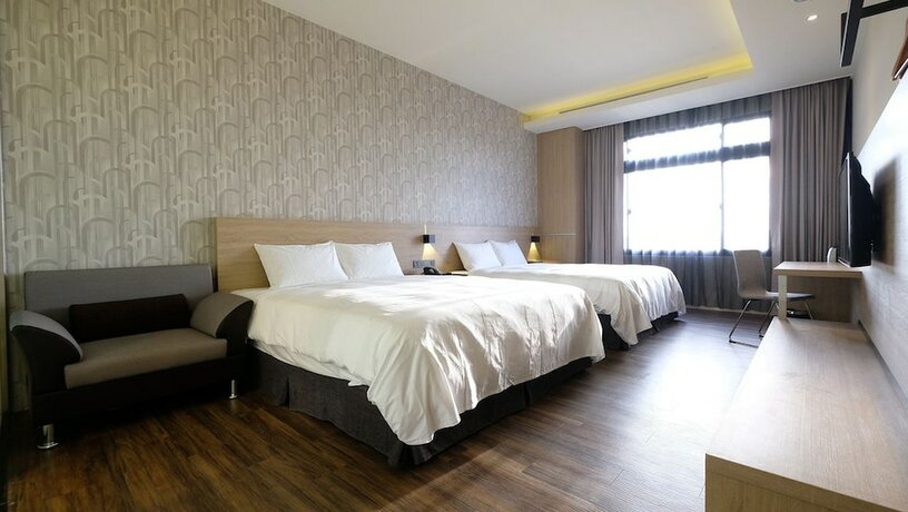 Imagen de la habitación del Hotel Yu Chun. Foto 16