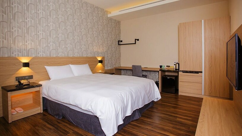 Imagen de la habitación del Hotel Yu Chun. Foto 21
