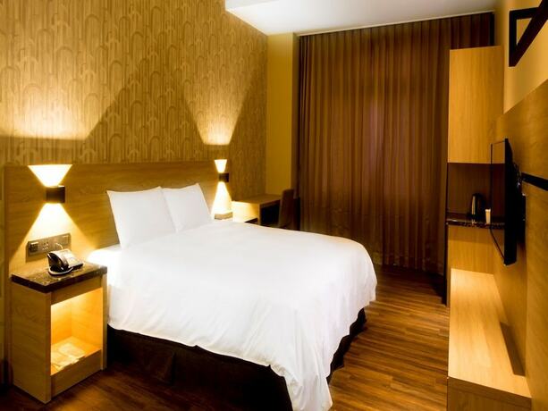 Imagen de la habitación del Hotel Yu Chun. Foto 23