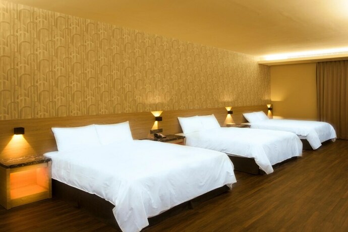 Imagen de la habitación del Hotel Yu Chun. Foto 25