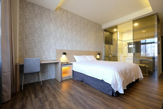 Imagen de la habitación del Hotel Yu Chun. Foto 27