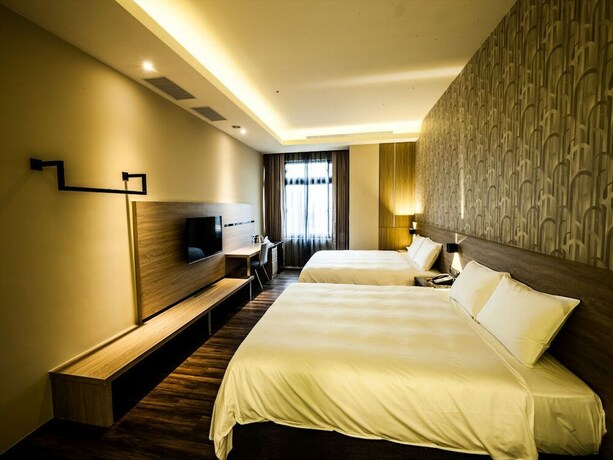 Imagen de la habitación del Hotel Yu Chun. Foto 31