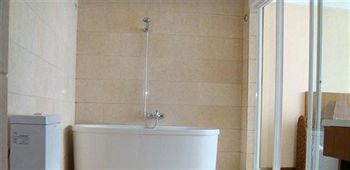 Imagen de la habitación del Hotel Yu Du - Tengchong. Foto 8