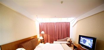 Imagen de la habitación del Hotel Yu Du - Tengchong. Foto 10