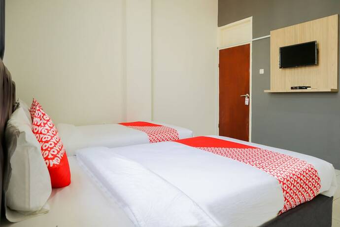 Imagen de la habitación del Hotel Yuan Garden Pasar Baru. Foto 3