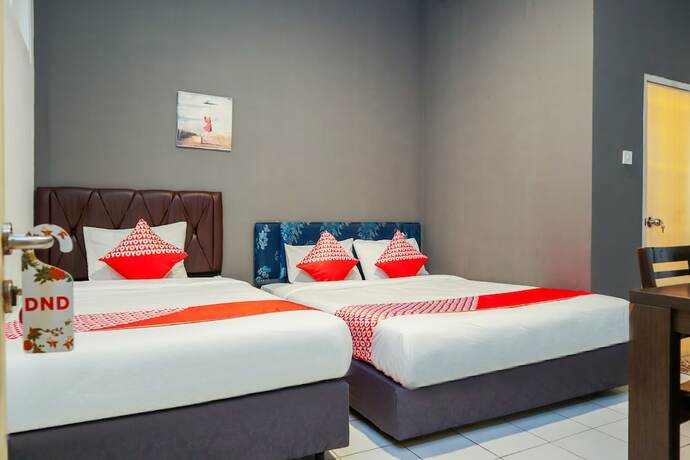 Imagen de la habitación del Hotel Yuan Garden Pasar Baru. Foto 10