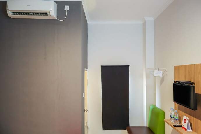 Imagen de la habitación del Hotel Yuan Garden Pasar Baru. Foto 11