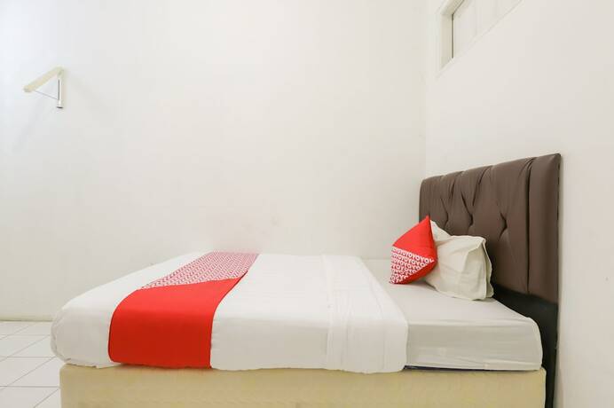 Imagen de la habitación del Hotel Yuan Garden Pasar Baru. Foto 13