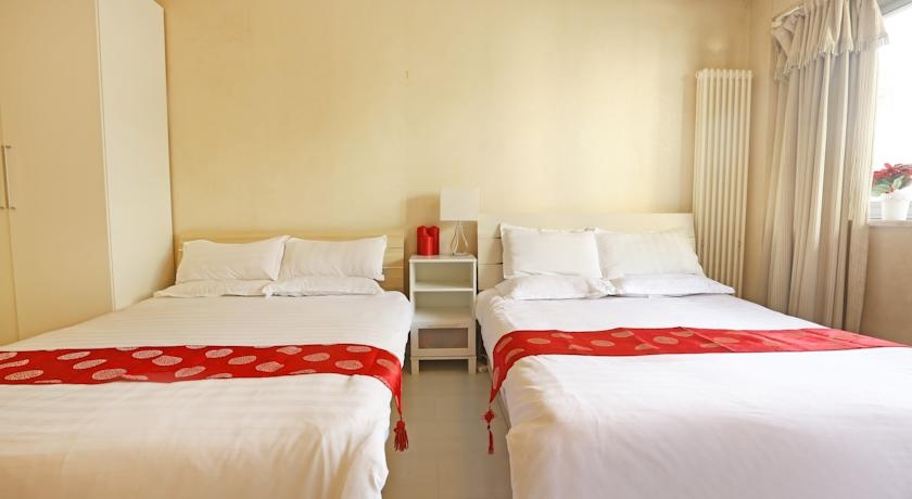 Imagen de la habitación del Hotel Yuan Jia International Apartment. Foto 3