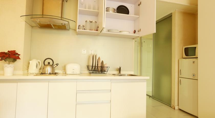 Imagen de la habitación del Hotel Yuan Jia International Apartment. Foto 4