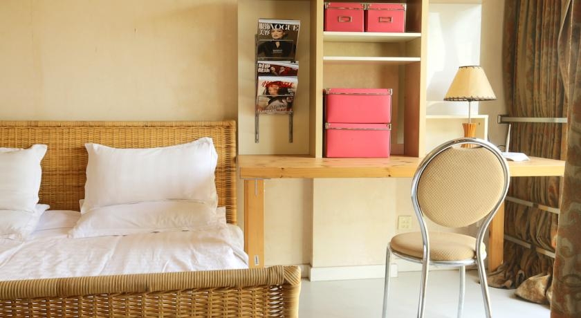 Imagen de la habitación del Hotel Yuan Jia International Apartment. Foto 6