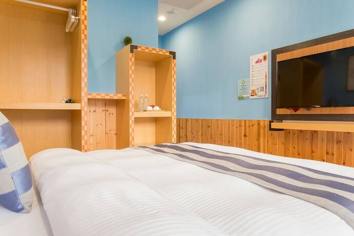 Imagen de la habitación del Hotel Yuan Su Inn. Foto 15