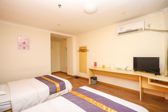 Imagen de la habitación del Hotel YuanMan. Foto 14