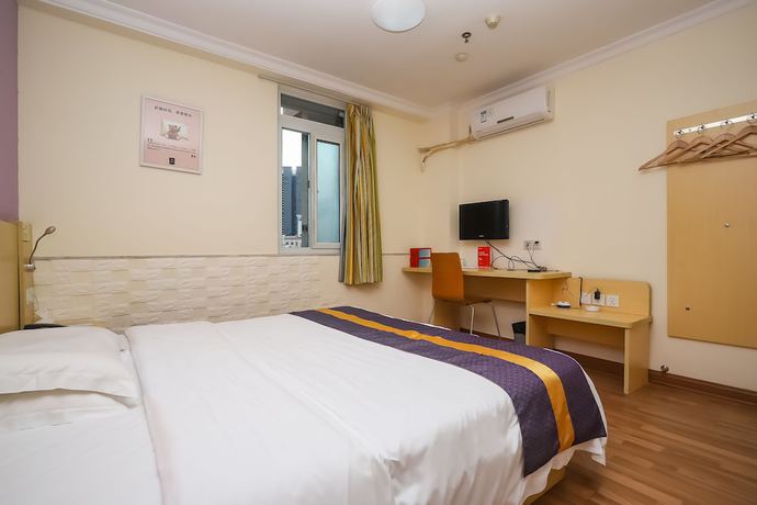 Imagen de la habitación del Hotel YuanMan. Foto 16